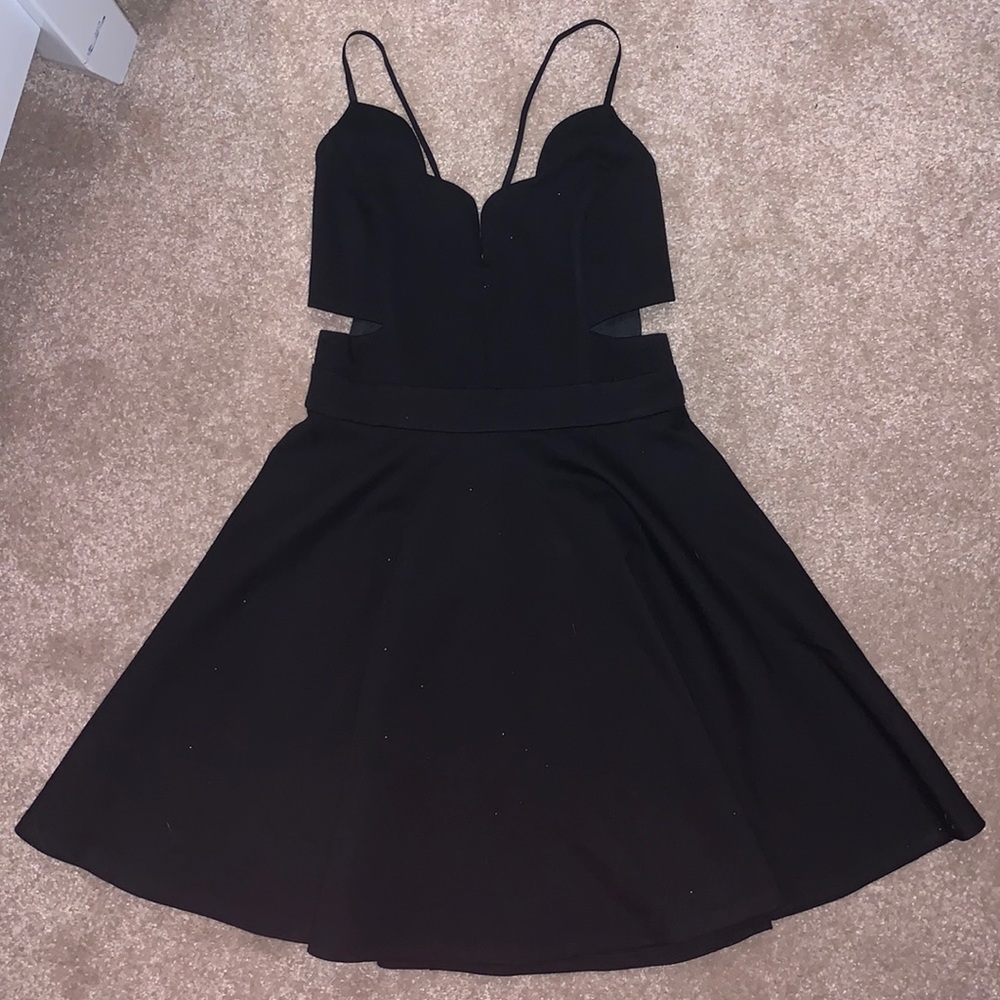 Black dress with fun cut outs and cute neckline